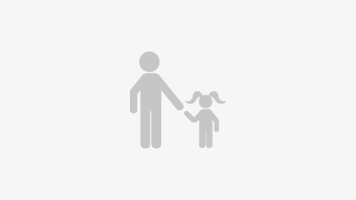 A small icon of a person and their child resembling family values and a family oriented company.