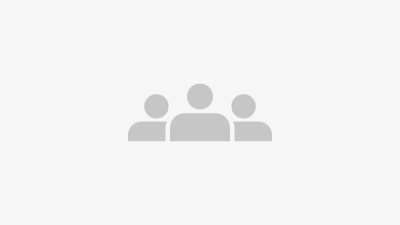 A small icon of three persons resembling the importance of Team & community at TGW Logistics