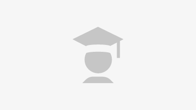 A small icon of a person with a graduation hat resembling the possibility of further training & development at TGW Logistics