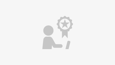 A small icon of a laptop and a medal