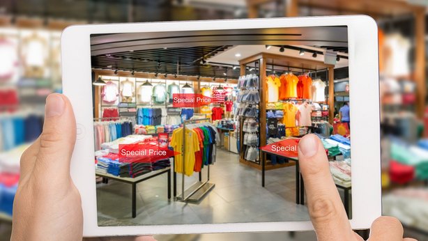 A view of a store through a tablet showing prices of various articles in the store