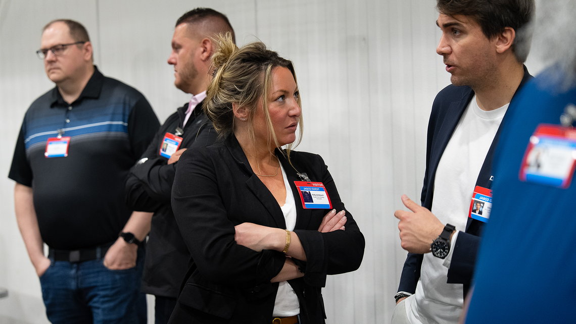Attendees of Campfire Talk at Jasco discuss the warehouse automation technologies