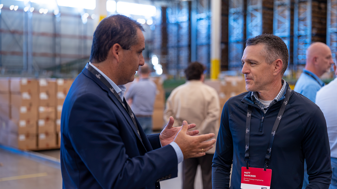 Campfire Talk attendees talking together at the Gap automated distribution center