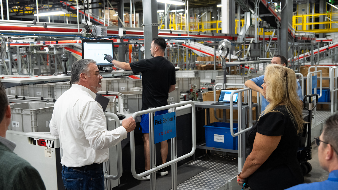 Attendees of Campfire Talk at Jasco learn about the goods to person picking process and warehouse automation