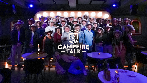 Group shot of the Campfire Talk attendees in custom cowboy hats with Campfire Talk logo overlay