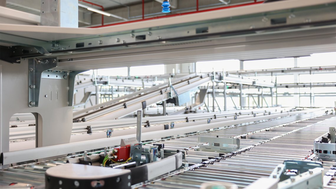 A totally empty conveyor belt system inside of an automated warehouse